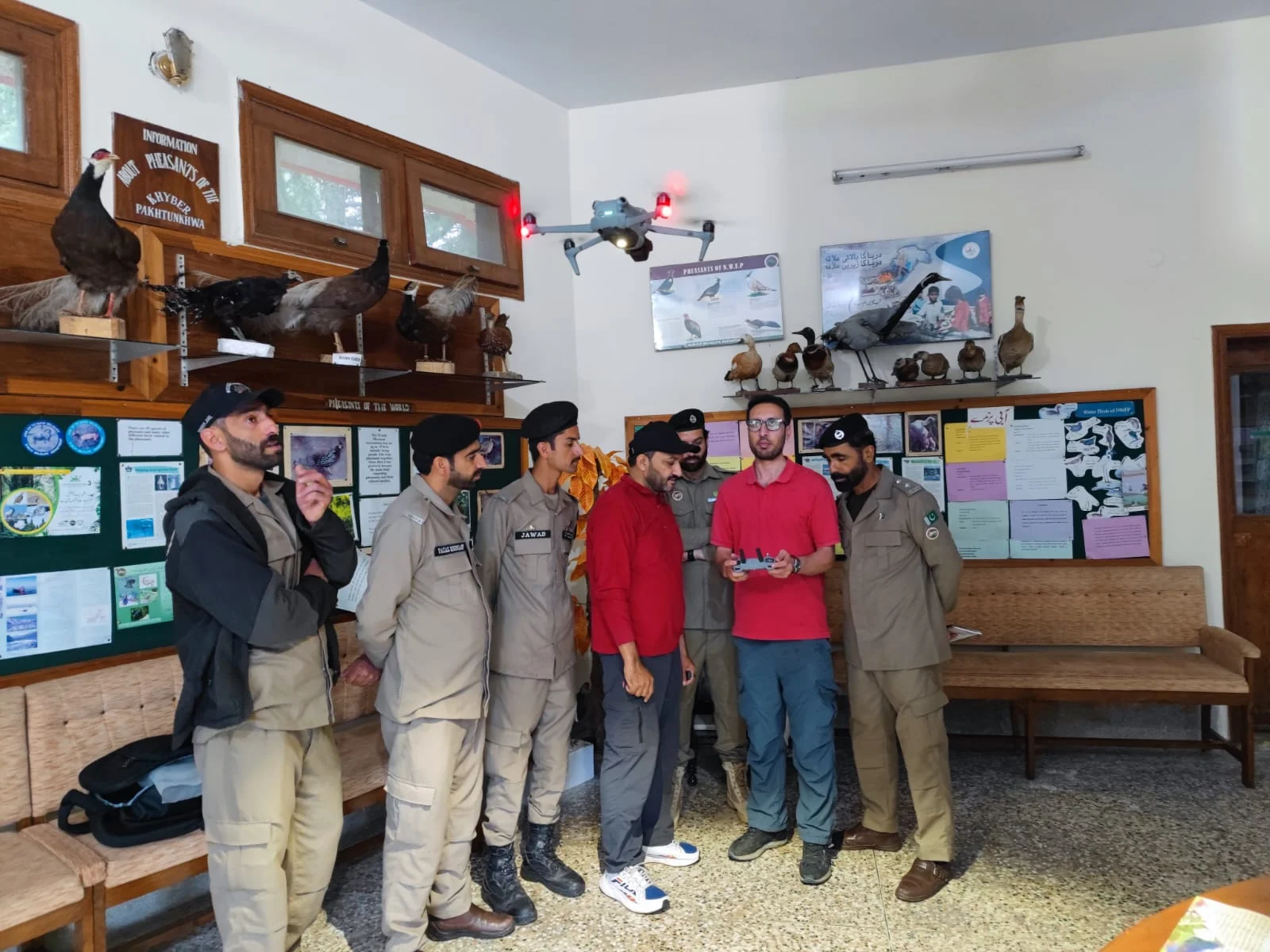 Wildlife guards learning camera trap setup